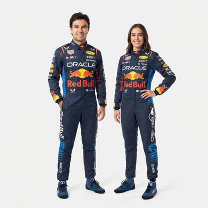 Man and woman in navy Red Bull Oracle racing suits, studio photo